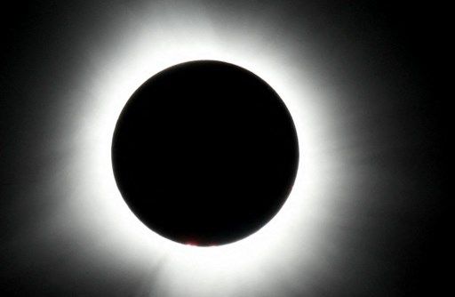 HOULTON, MAINE - APRIL 08: The sun reaches totality during the eclipse on April 08, 2024 in Houlton, Maine. Millions of people have flocked to areas across North America that are in the 