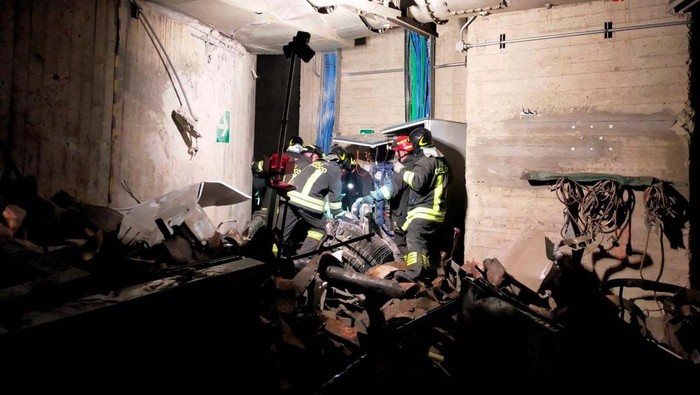 An ambulance drives away from the Enel hydroelectric power plant after a fatal explosion and fire, in Bargi, Italy, April 9, 2024. REUTERS/Claudia Greco