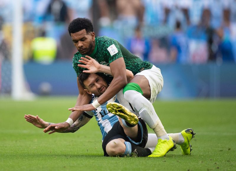 Ali Al Bulayhi, Lionel Messi LUSAIL CITY, QATAR - NOVEMBER 22: Lionel Messi of Argentina and Ali Al-Bulayhi of Saudi Arabia during the FIFA World Cup Qatar 2022 Group C match between Argentina and Saudi Arabia at Lusail Stadium on November 22, 2022 in Lusail City, Qatar. (Photo by Visionhaus/Getty Images)