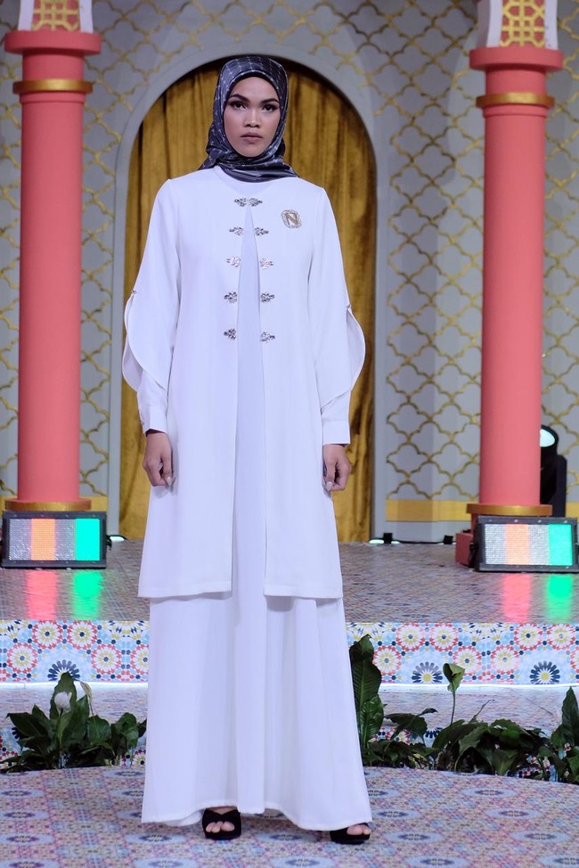 Nina Nugroho menghadirkan koleksi Hari Raya dengan tema Simplicity. Baju Lebaran 2024 karya Nina, terinspirasi dari keseharian perempuan aktif yang memiliki multi peran mulai dari sebagai ibu, istri, sekaligus sebagai anak bagi orang tuanya. Foto: Dok. Nina Nugroho.