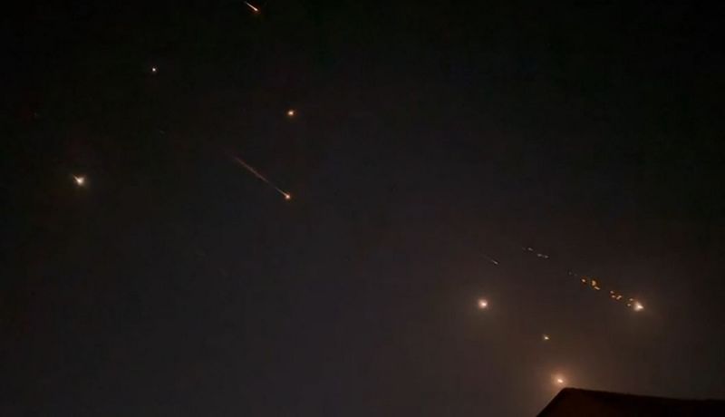 This video grab from AFPTV taken on April 14, 2024 shows explosions lighting up the sky in Hebron, Palestinian Territories, during an Iranian attack on Israel. Iran's Revolutionary Guards confirmed early April 14, 2024 that a drone and missile attack was under way against Israel in retaliation for a deadly April 1 drone strike on its Damascus consulate. (Photo by AFPTV / AFP)