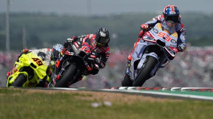 MotoGP rider Marc Marquez (93), of Spain, leads Maverick Vinales (12), of Spain, and Fabio di Giannantonio (49), of Italy, through a turn during qualifying for the MotoGP Grand Prix of the Americas motorcycle race at the Circuit of the Americas, Saturday, April 13, 2023, in Austin, Texas. (AP Photo/Eric Gay)