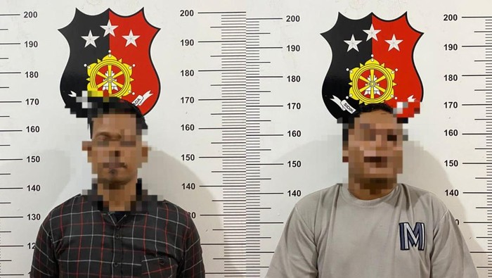 Kedua pelaku gadai fiktif saat diamankan di Polresta Tanjungpinang.(Dok Polresta Tanjungpinang)