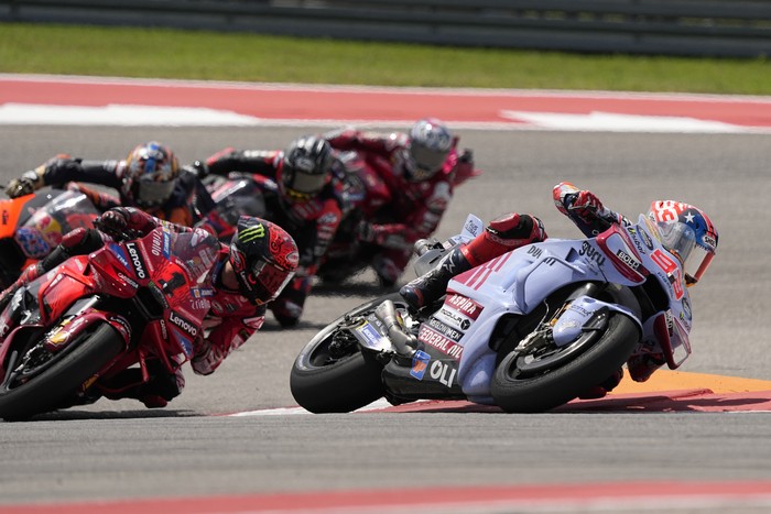 Marc Marquez (93), of Spain, leads through a turn during the MotoGP Grand Prix of the Americas motorcycle race at Circuit of the Americas, Sunday, April 14, 2024, in Austin, Texas. (AP Photo/Eric Gay)