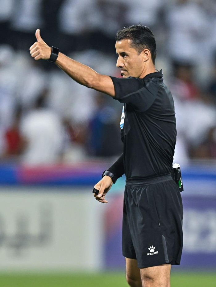 Referee Nasrullo Kabirov from Tajikistan is gesturing during the AFC U23 Asian Cup Qatar 2024 Group A match between Qatar and Indonesia at Jassim Bin Hamad Stadium in Doha, Qatar, on April 15, 2024. (Photo by Noushad Thekkayil/NurPhoto via Getty Images)