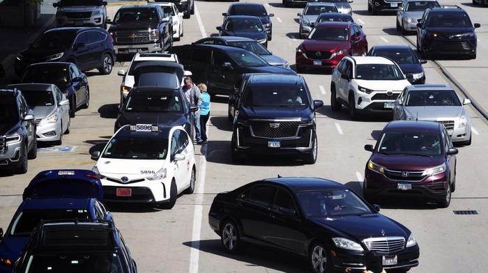 Heavy traffic is seen at O'Hare International Airport in Chicago, Monday, April 15, 2024. Pro-Palestinian demonstrators blocked a freeway leading to three Chicago O'Hare International Airport terminals Monday morning, temporarily stopping vehicle traffic into one of the nation's busiest airports and causing headaches for travelers. (AP Photo/Nam Y. Huh)