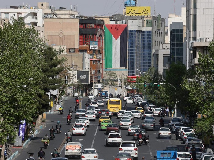 An anti-Israel billboard with a picture of Iranian missiles is seen in a street in Tehran, Iran April 15, 2024. Majid Asgaripour/WANA (West Asia News Agency) via REUTERS ATTENTION EDITORS - THIS IMAGE HAS BEEN SUPPLIED BY A THIRD PARTY.