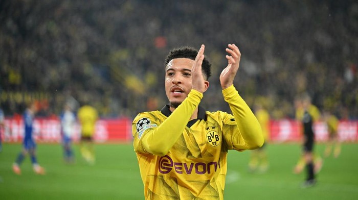 16 April 2024, North Rhine-Westphalia, Dortmund: Soccer: Champions League, Borussia Dortmund - Atlético Madrid, knockout round, quarter-finals, second leg, Signal Iduna Park. Dortmunds Jadon Sancho applauds his substitution. Photo: Bernd Thissen/dpa (Photo by Bernd Thissen/picture alliance via Getty Images)