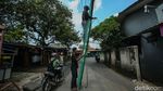 Kabal Fiber Optik Putus-Menjuntai di Jalan Resahkan Warga Depok