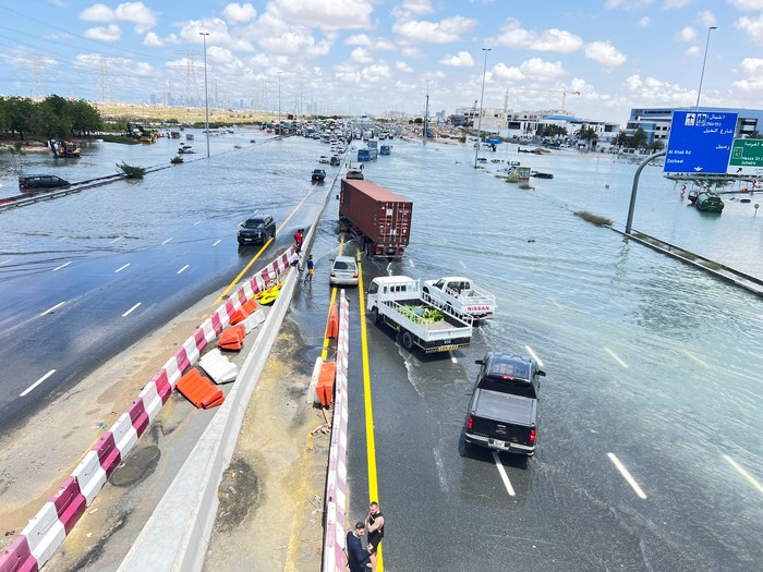 Cars are stuck on a flooded road after a rainstorm hit Dubai, in Dubai, United Arab Emirates, April 17, 2024. REUTERS/Rula Rouhana