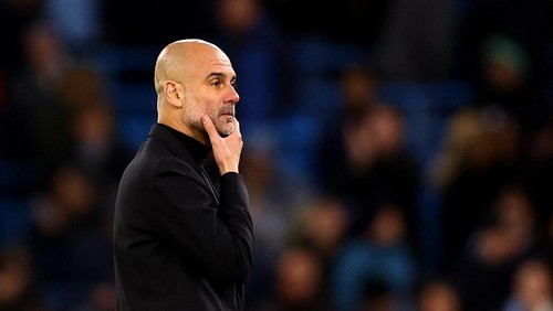 Soccer Football - Champions League - Quarter Final - Second Leg - Manchester City v Real Madrid - Etihad Stadium, Manchester, Britain - April 17, 2024 Manchester City manager Pep Guardiola reacts during the penalty shootout REUTERS/Carl Recine