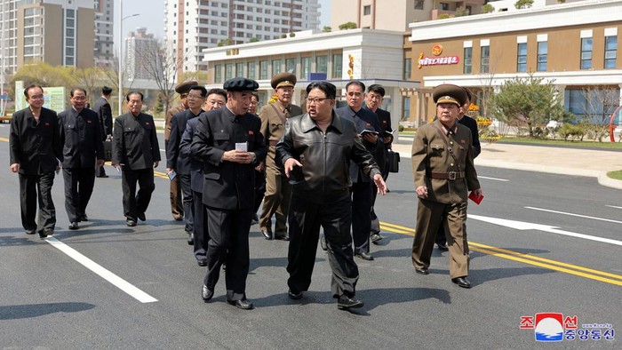 North Korean leader Kim Jong Un cuts the ribbon during a completion ceremony for a residential development area in Hwasong district, North Korea, April 16, 2024, in this picture released by the Korean Central News Agency.    KCNA via REUTERS    ATTENTION EDITORS - THIS IMAGE WAS PROVIDED BY A THIRD PARTY. REUTERS IS UNABLE TO INDEPENDENTLY VERIFY THIS IMAGE. NO THIRD PARTY SALES. SOUTH KOREA OUT. NO COMMERCIAL OR EDITORIAL SALES IN SOUTH KOREA.