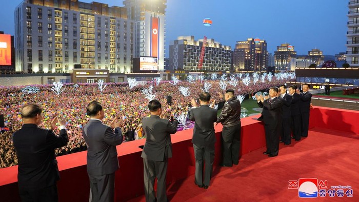 North Korean leader Kim Jong Un cuts the ribbon during a completion ceremony for a residential development area in Hwasong district, North Korea, April 16, 2024, in this picture released by the Korean Central News Agency.    KCNA via REUTERS    ATTENTION EDITORS - THIS IMAGE WAS PROVIDED BY A THIRD PARTY. REUTERS IS UNABLE TO INDEPENDENTLY VERIFY THIS IMAGE. NO THIRD PARTY SALES. SOUTH KOREA OUT. NO COMMERCIAL OR EDITORIAL SALES IN SOUTH KOREA.
