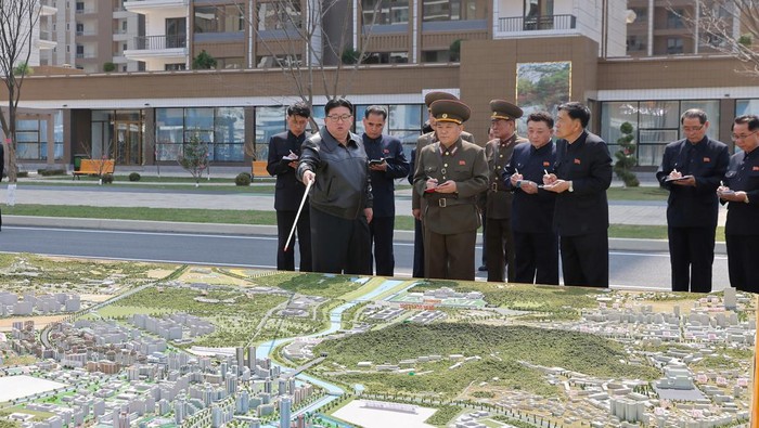 North Korean leader Kim Jong Un cuts the ribbon during a completion ceremony for a residential development area in Hwasong district, North Korea, April 16, 2024, in this picture released by the Korean Central News Agency.    KCNA via REUTERS    ATTENTION EDITORS - THIS IMAGE WAS PROVIDED BY A THIRD PARTY. REUTERS IS UNABLE TO INDEPENDENTLY VERIFY THIS IMAGE. NO THIRD PARTY SALES. SOUTH KOREA OUT. NO COMMERCIAL OR EDITORIAL SALES IN SOUTH KOREA.
