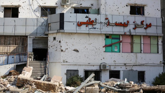 Palestinians streak bicycles previous Al Basma IVF Centre, Gaza's largest fertility medical institution which became as soon as struck by an Israeli shell sometime of the continuing battle between Israel and the Palestinian Islamist community Hamas, in Gaza City, April 2, 2024. REUTERS/Dawoud Abu Alkas