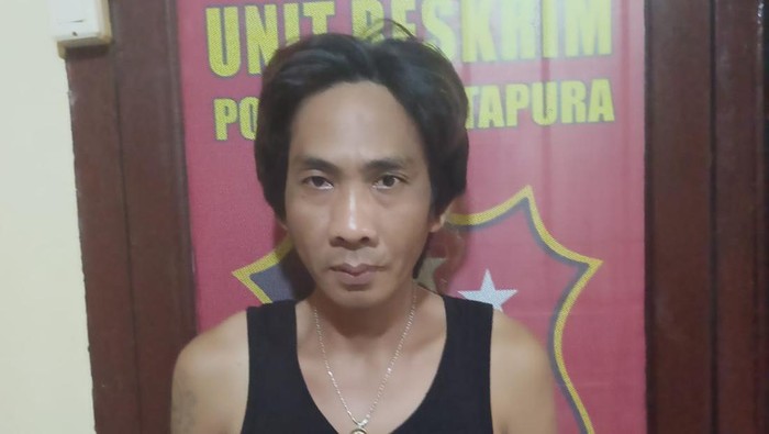 Tampang Mediansyah, perampok bus pariwisata di OKU Timur saat diamankan di kantor polisi