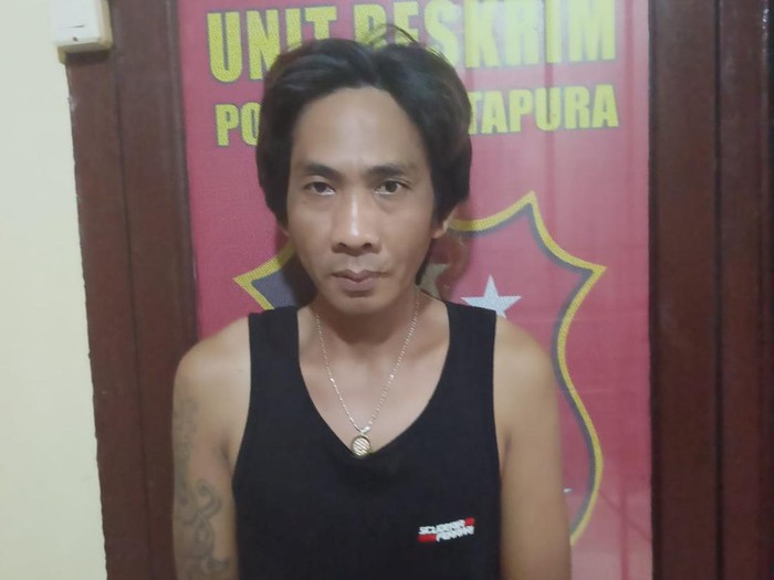 Tampang Mediansyah, perampok bus pariwisata di OKU Timur saat diamankan di kantor polisi