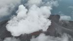 Foto Udara Permukiman Tertutup Abu Vulkanik Gunung Ruang