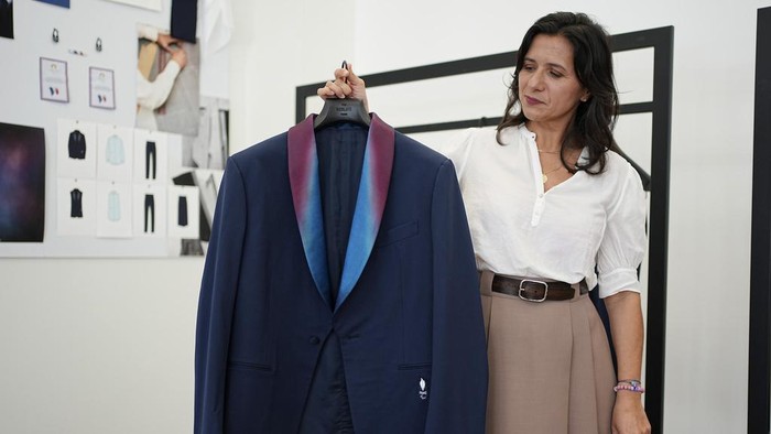 Uniforms and shoes for the Team France opening ceremony are presented at the Berluti offices in Paris, Wednesday April 10, 2024. The fashion house designed Team France's uniforms for the Paris 2024 Olympic Games opening ceremony. (AP Photo/Laurent Cipriani)