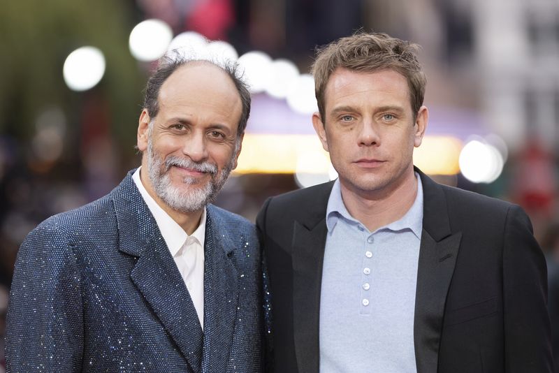Director Luca Guadagnino and designer Jonathan Anderson pose for photographers upon arrival at the premiere of the film 'Challengers' on Wednesday, April 10, 2024 in London. (Photo by Vianney Le Caer/Invision/AP)