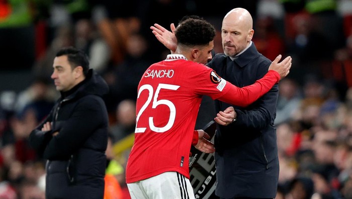 MANCHESTER, UNITED KINGDOM - FEBRUARY 23: (L-R) Jadon Sancho of Manchester United, Coach Erik Ten Hag of Manchester United  during the UEFA Europa League   match between Manchester United v FC Barcelona at the Old Trafford on February 23, 2023 in Manchester United Kingdom (Photo by David S. Bustamante/Soccrates/Getty Images)