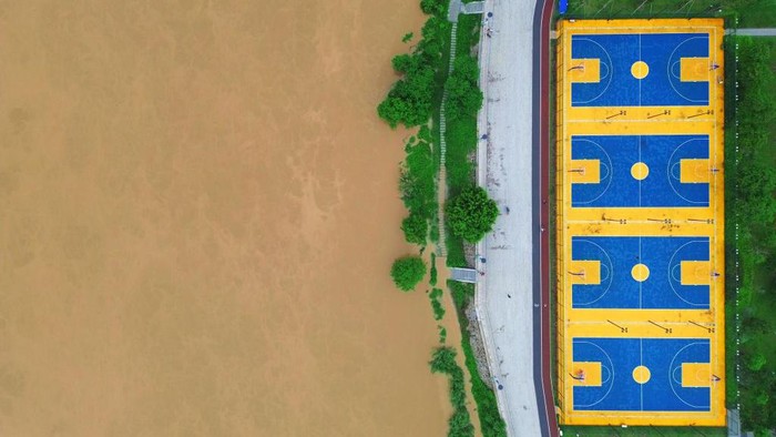 Hujan lebat di China, menyebabkan sejumlah sungai meluap. Salah satunya sungai Dongping.