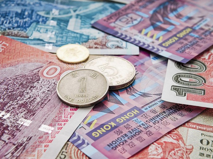 Close-up of Hong Kong Dollar coins and notes of various denominations.