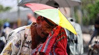 Gelombang Panas di Bangladesh, Warga Pakai Pelindung Kepala