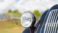 Lampu bulat menjadi aksen mobil zaman dulu. Foto: Mecum Auction