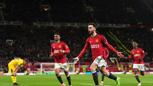 Manchester Uniteds Bruno Fernandes celebrates scoring their sides third goal of the game during the Premier League match at Old Trafford, Manchester. Picture date: Wednesday April 24, 2024. (Photo by Martin Rickett/PA Images via Getty Images)