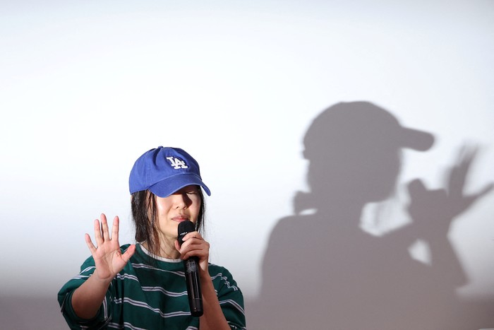 Min Hee-jin, CEO of HYBEs sub-label Ador, reacts against flashlights during a press conference in Seoul, South Korea, April 25, 2024. REUTERS/Kim Hong-Ji