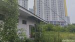 Penampakan Terkini Wisma Atlet Kemayoran: Pagar Rusak-Ditumbuhi Semak Belukar