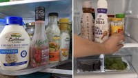 Lazy susan biasanya hanya ada di meja makan, tapi kali ini juga bisa ditaruh di kulkas. Kamu pun tak akan repot saat ingin mengambil botol condiment yang diinginkan. Foto: BuzzFeed