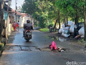 Hati-hati Ada Lubang di Jalan Inspeksi Cidurian Bandung