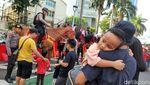 Berebut Foto dengan Polisi Berkuda di CFD