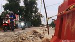 Potret Jalan Raya Badami-Loji Karawang yang Rusak Parah
