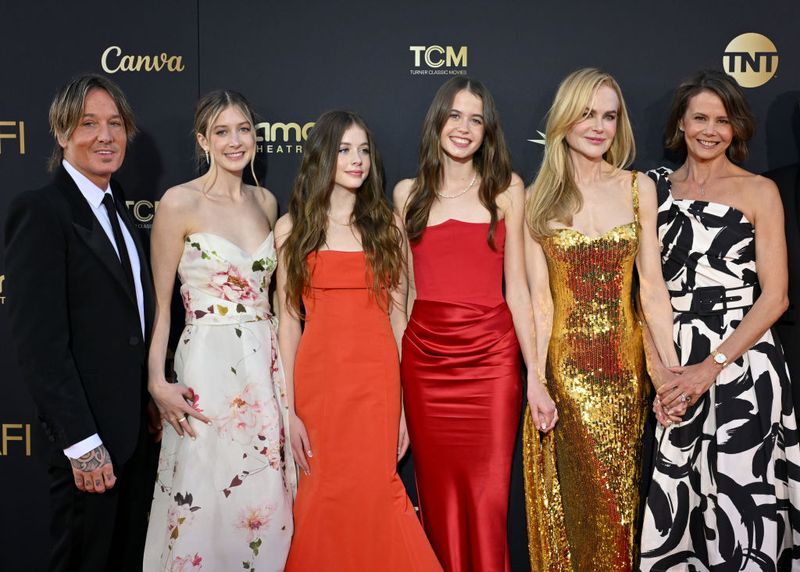 HOLLYWOOD, CALIFORNIA - APRIL 27: (L-R) Keith Urban, Sunday Rose Kidman-Urban, Faith Margaret Kidman-Urban, Sybella Hawley, Nicole Kidman, and Antonia Kidman attend the 49th AFI Life Achievement Award Gala Tribute Celebrating Nicole Kidman at Dolby Theatre on April 27, 2024 in Hollywood, California. (Photo by Axelle/Bauer-Griffin/FilmMagic)