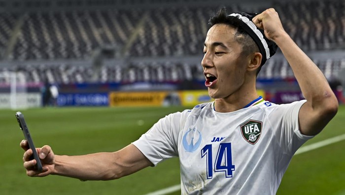 Abbosbek Fayzullaev of Uzbekistan is celebrating his victory after the AFC U23 Asian Cup Qatar 2024 quarter-final match between Uzbekistan and Saudi Arabia at Khalifa International Stadium in Doha, Qatar, on April 26, 2024. (Photo by Noushad Thekkayil/NurPhoto via Getty Images)