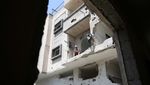 Pilu Warga Gaza di Tengah Puing Bangunan Sisa Serangan Israel