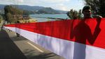 Merah Putih 11.000 Meter Membentang di Hari Pembebasan Irian Barat
