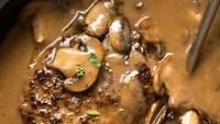 Menu Salisbury Steak diciptakan oleh dokter James Salisbury untuk mengobati wabah diare. Protein dari steak dipercaya bisa mengobatinya. Foto: Site News