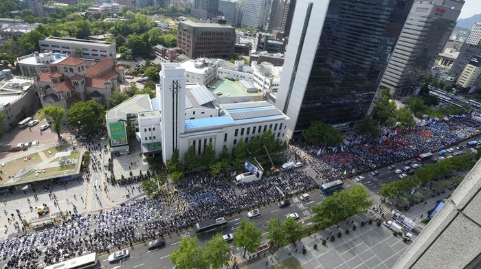 Members of the Korean Confederation of Trade Unions gather to attend a rally on May Day in Seoul, South Korea, Wednesday, May 1, 2024. Workers, activists and others in Asian capitals took to the streets on Wednesday to mark May Day with protests over rising prices and governments' labor polices and calls for greater labor rights. (AP Photo/Ahn Young-joon)