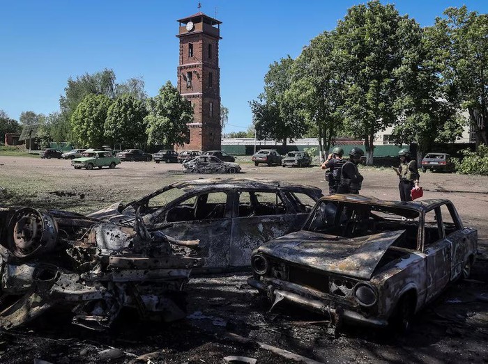 Police work at a site of a Russian missile strike, amid Russias attack on Ukraine, in the village of Zolochiv in Kharkiv region, Ukraine May 1, 2024. REUTERS/Vyacheslav Madiyevskyy Purchase Licensing Rights