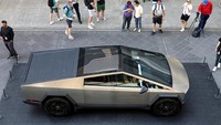 Bodi truk pikap listrik itu terbuat dari paduan baja tahan karat yang dikembangkan oleh Tesla.  