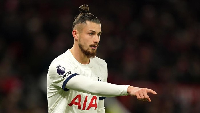Tottenham Hotspurs Radu Dragusin during the Premier League match at Old Trafford, Manchester. Picture date: Sunday January 14, 2024. (Photo by Martin Rickett/PA Images via Getty Images)