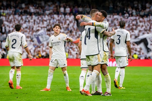 Jose Luis Sanmartin Mato (Joselu) of Real Madrid (left) and Jude Bellingham of Real Madrid (right) are celebrating a goal during the La Liga EA Sports 2023/24 football match between Real Madrid and Cadiz CF at Estadio Santiago Bernabeu in Madrid, Spain, on May 4, 2024. (Photo by Alberto Gardin/NurPhoto via Getty Images)