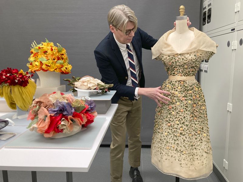 Curator Andrew Bolton displays garments in the conservation space of the Costume Institute of the Metropolitan Museum of Art in Manhattan, Nov. 8, 2023. The garments will be part of the upcoming spring exhibit at the Costume Institute, launched by the Met Gala. 