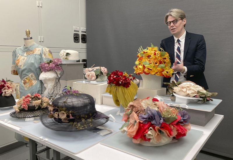 Curator Andrew Bolton displays garments in the conservation space of the Costume Institute of the Metropolitan Museum of Art in Manhattan, Nov. 8, 2023. The garments will be part of the upcoming spring exhibit at the Costume Institute, launched by the Met Gala. 