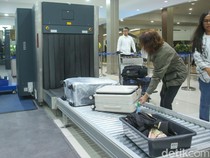 Ini Alasan Kita Harus Mengeluarkan Laptop saat Pemeriksaan Bandara