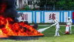 Simulasi Padamkan Api Peringati Pencegahan Bencana Nasional di China